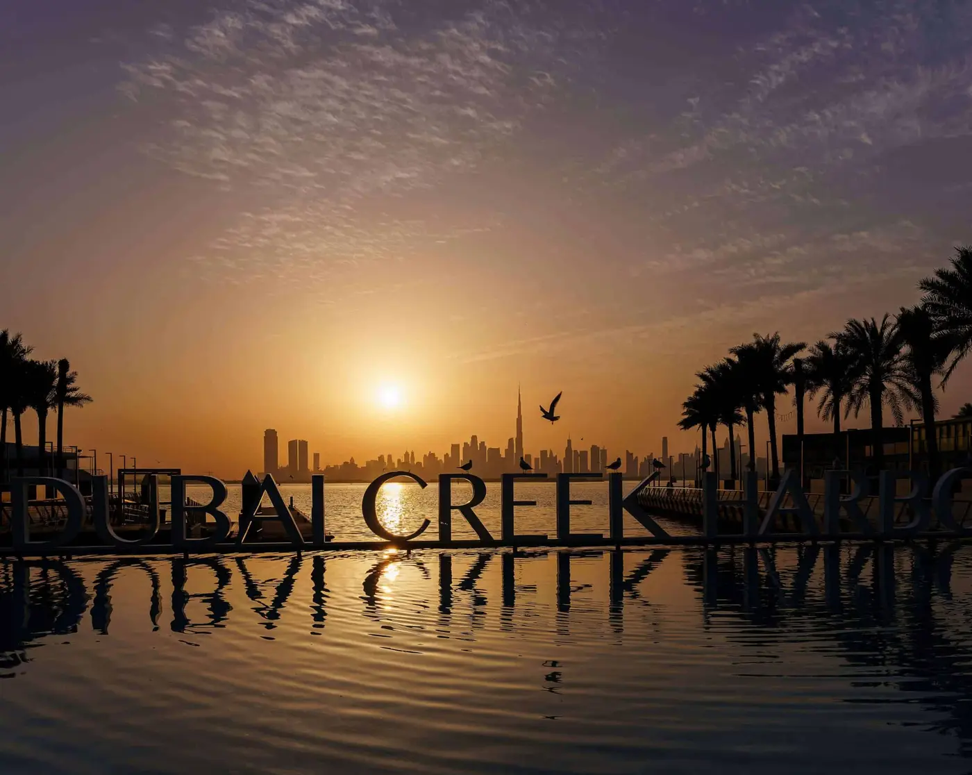 Dubai Creek Harbour at sunset with the view of the waterfront