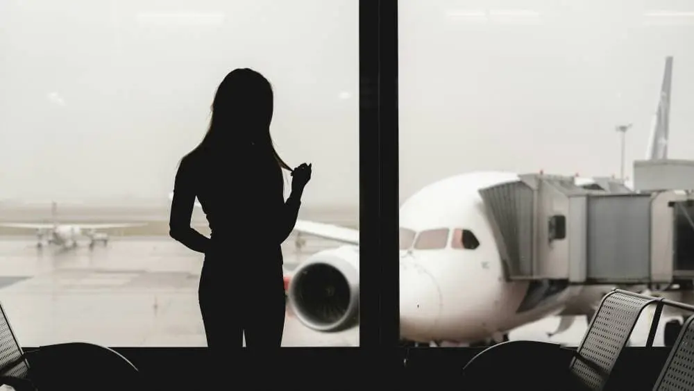A woman standing in an airport